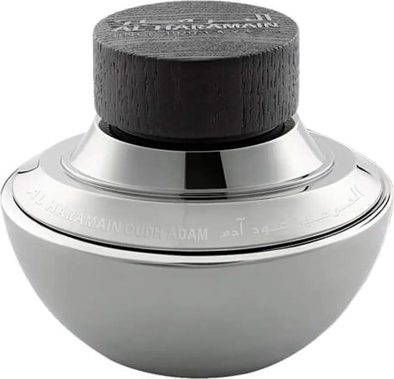 Flakon perfum Al Haramain Oudh Adam woda perfumowana 75ml z eleganckim drewnianym korkiem na białym tle - luksusowe arabskie perfumy