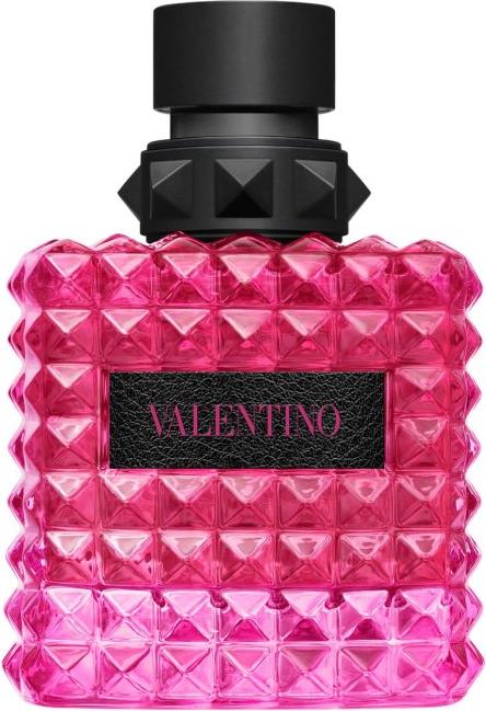 Elegancki różowy flakon perfum VALENTINO Born in Roma Extra-Dose Donna z rockowymi ćwiekami na białym tle - woda perfumowana dla kobiet