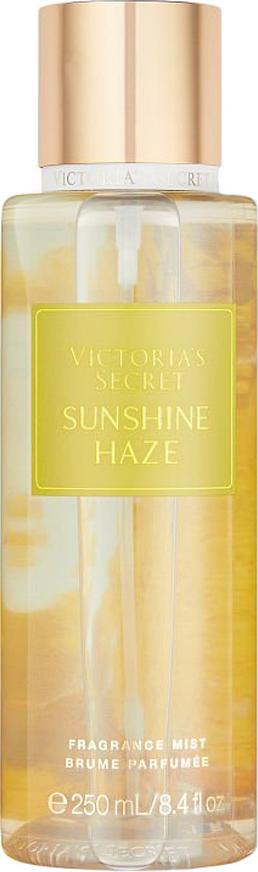 Flacon mgiełki do ciała Victoria's Secret Sunshine Haze 250ml z eleganckim opakowaniem marki Victoria's Secret na białym tle